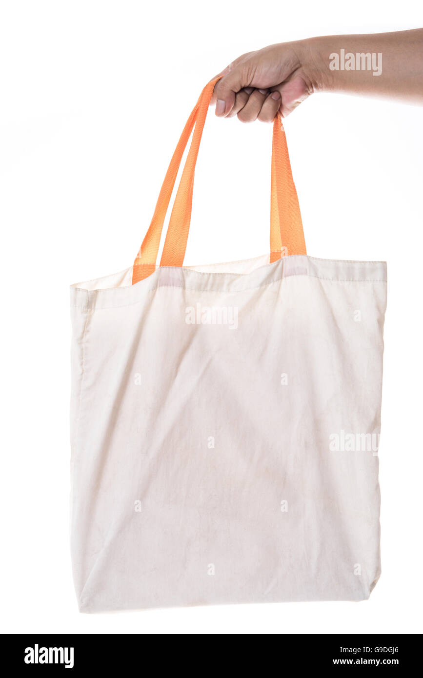 Hand, die Baumwolle Öko Tasche auf weißem Hintergrund Stockfoto