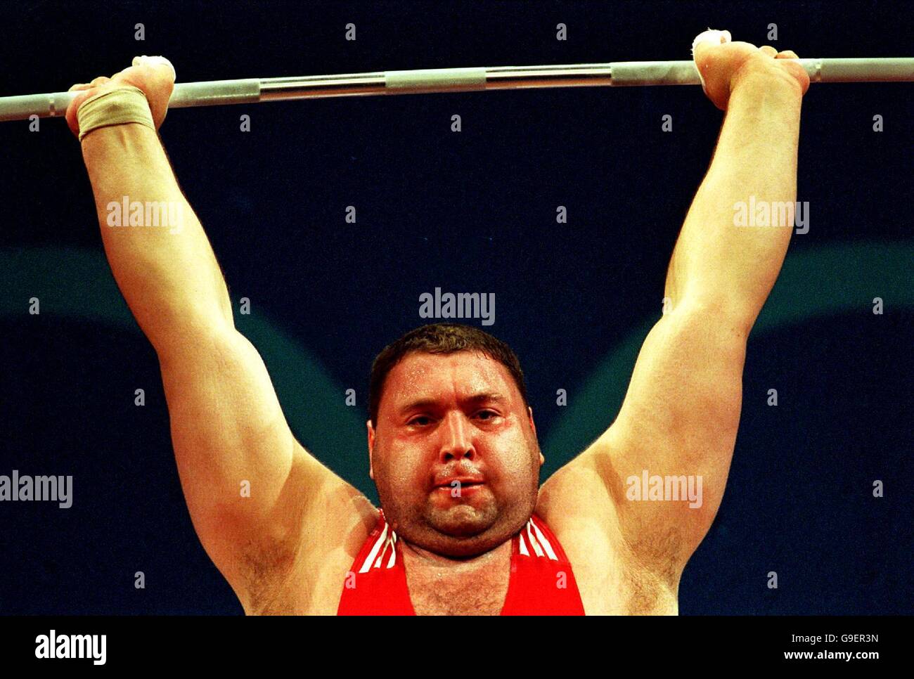 Olympische Spiele 2000 in Sydney – Gewichtheben – +105 kg für Männer. Bronzemedaillengewinnerin Ashot Danielyan aus Armenien in Aktion Stockfoto