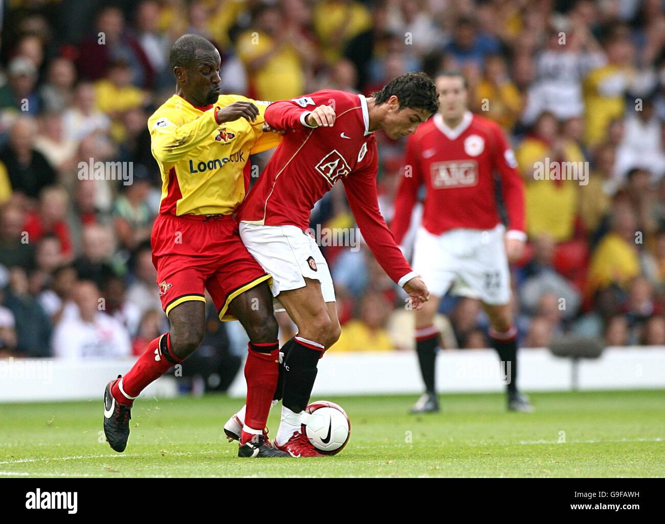 (L-R) Chris Powell von Watford und Cristiano Ronaldo von Manchester United Stockfoto