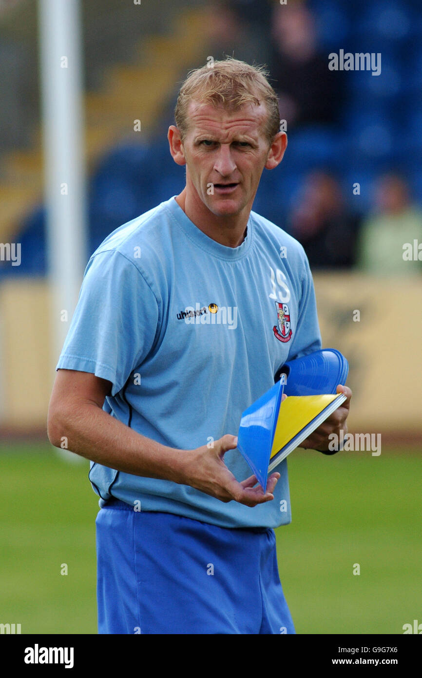 Fußball - Coca-Cola Football League Two - Mansfield Town / Lincoln City - Field Mill. Lincoln City Manager John Schofield Stockfoto