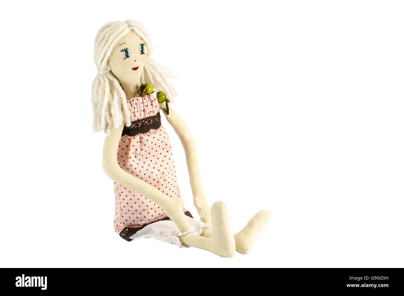 Puppe mit blondem Haar, isoliert auf weiss Stockfoto