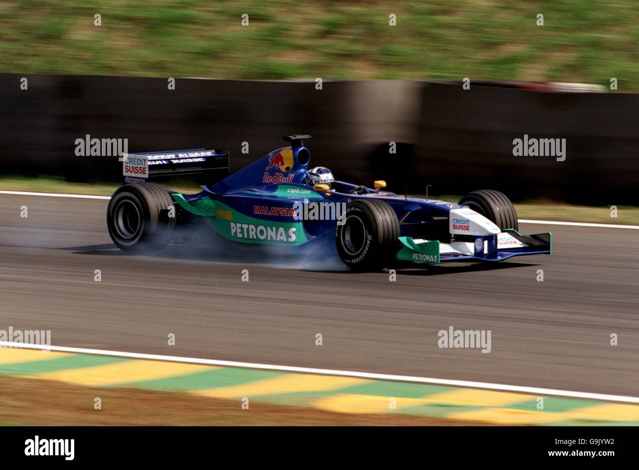Kimi Räikkönen raucht seine Reifen während der frühen Runden Der große Preis von Brasilien Stockfoto