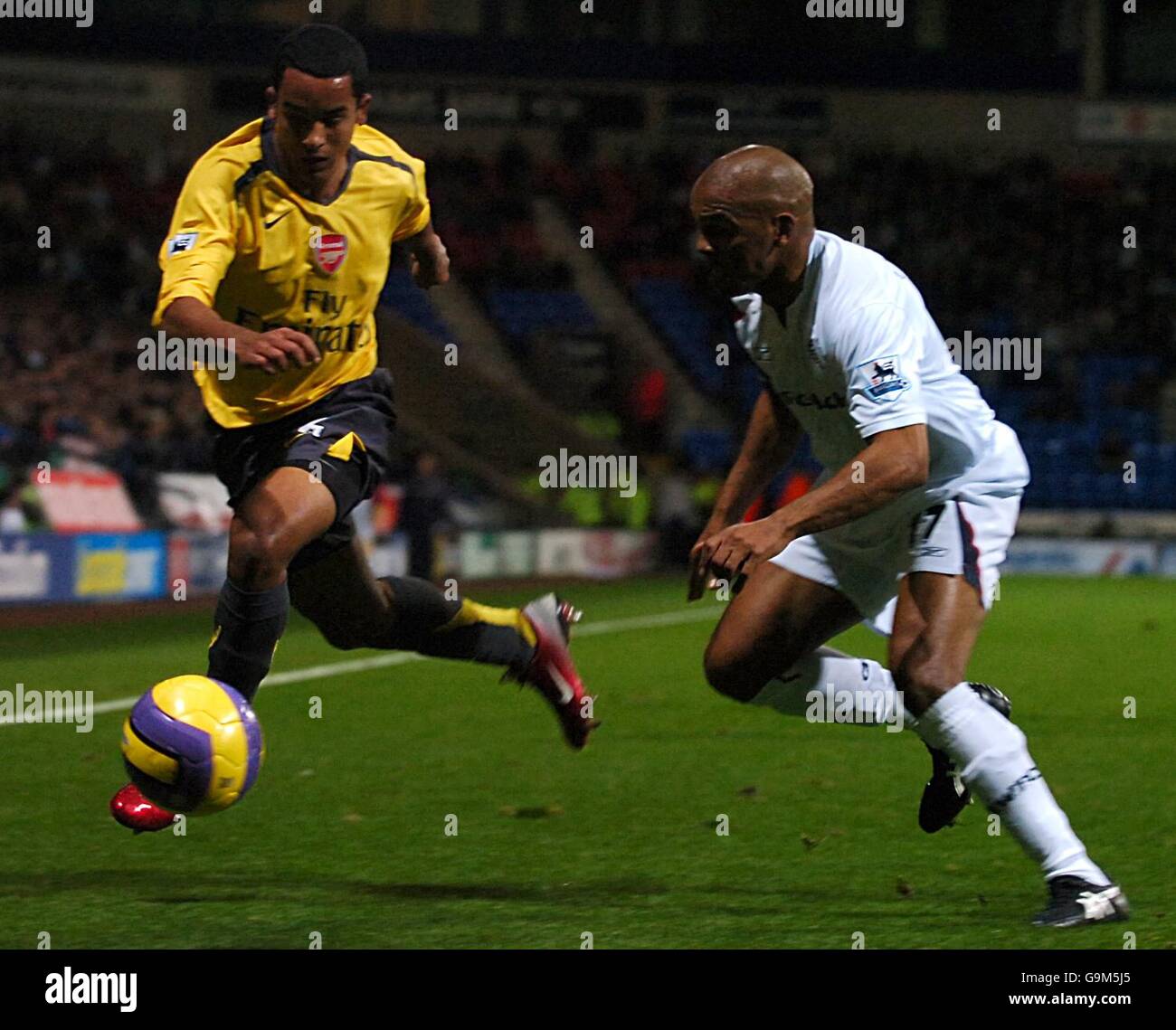 Theo Walcott von Arsenal und Quinton Wanderers Fortune von Bolton Stockfoto