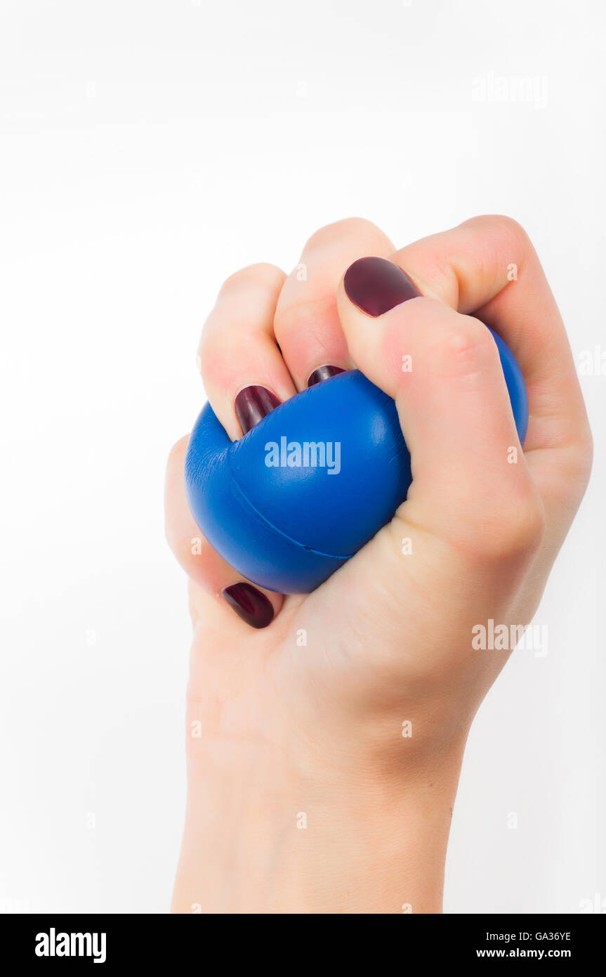 Stress-Ball in der Hand auf einem weißen Hintergrund Stockfoto
