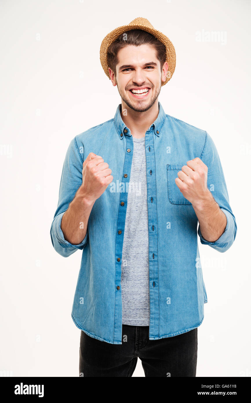 Lässige hübscher junger Mann freut sich auf dem weißen Hintergrund isoliert Stockfoto