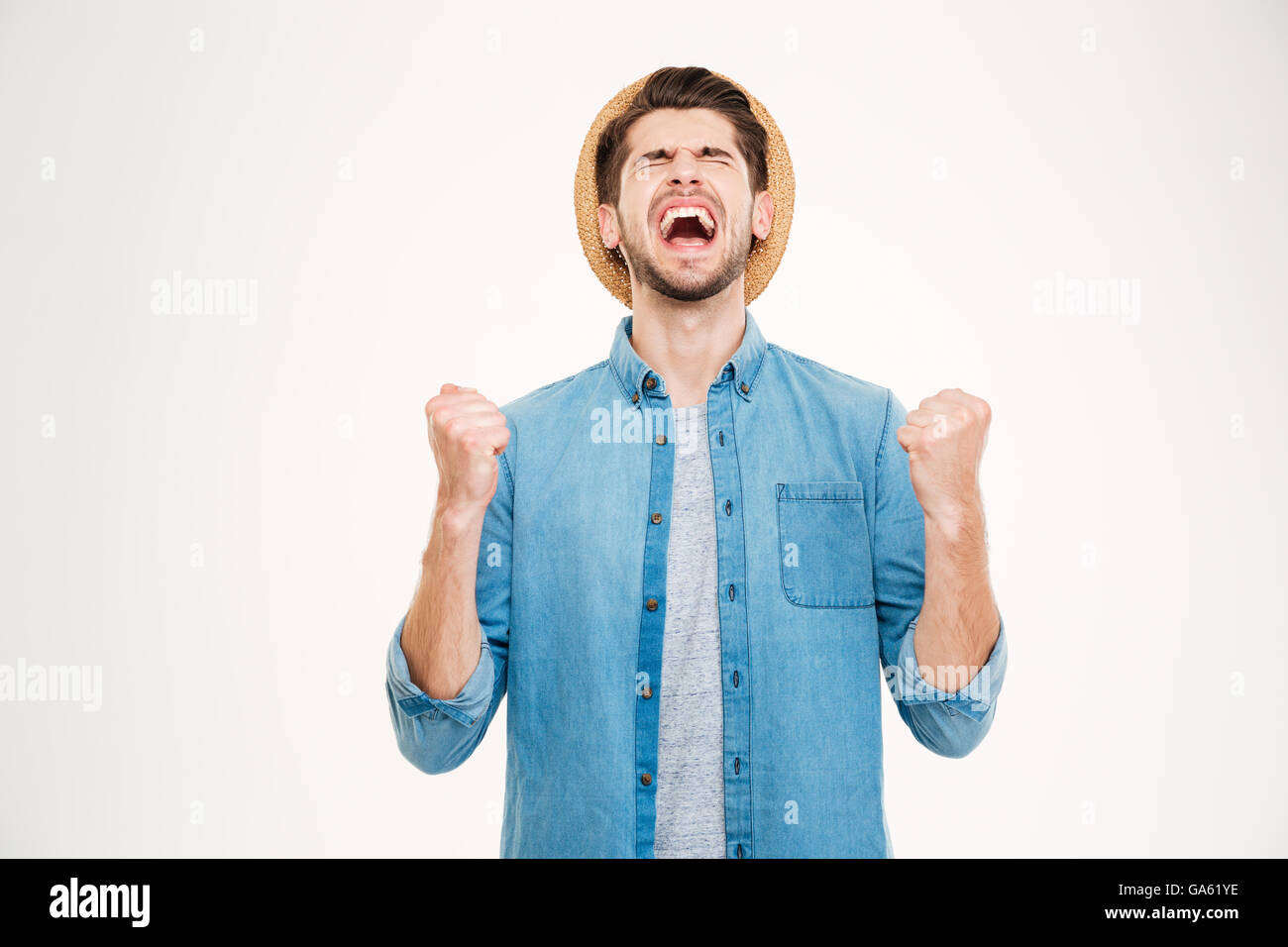 Schön lässig junger Mann zeigt Spannung isoliert auf weißem Hintergrund Stockfoto