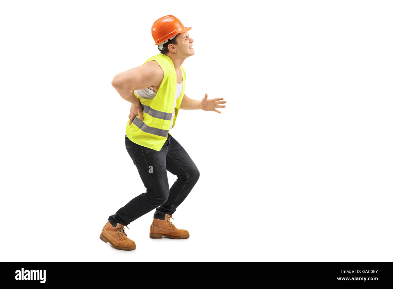 Männlichen Bauarbeiter erleben schwere Rückenschmerzen isoliert auf weißem Hintergrund Stockfoto