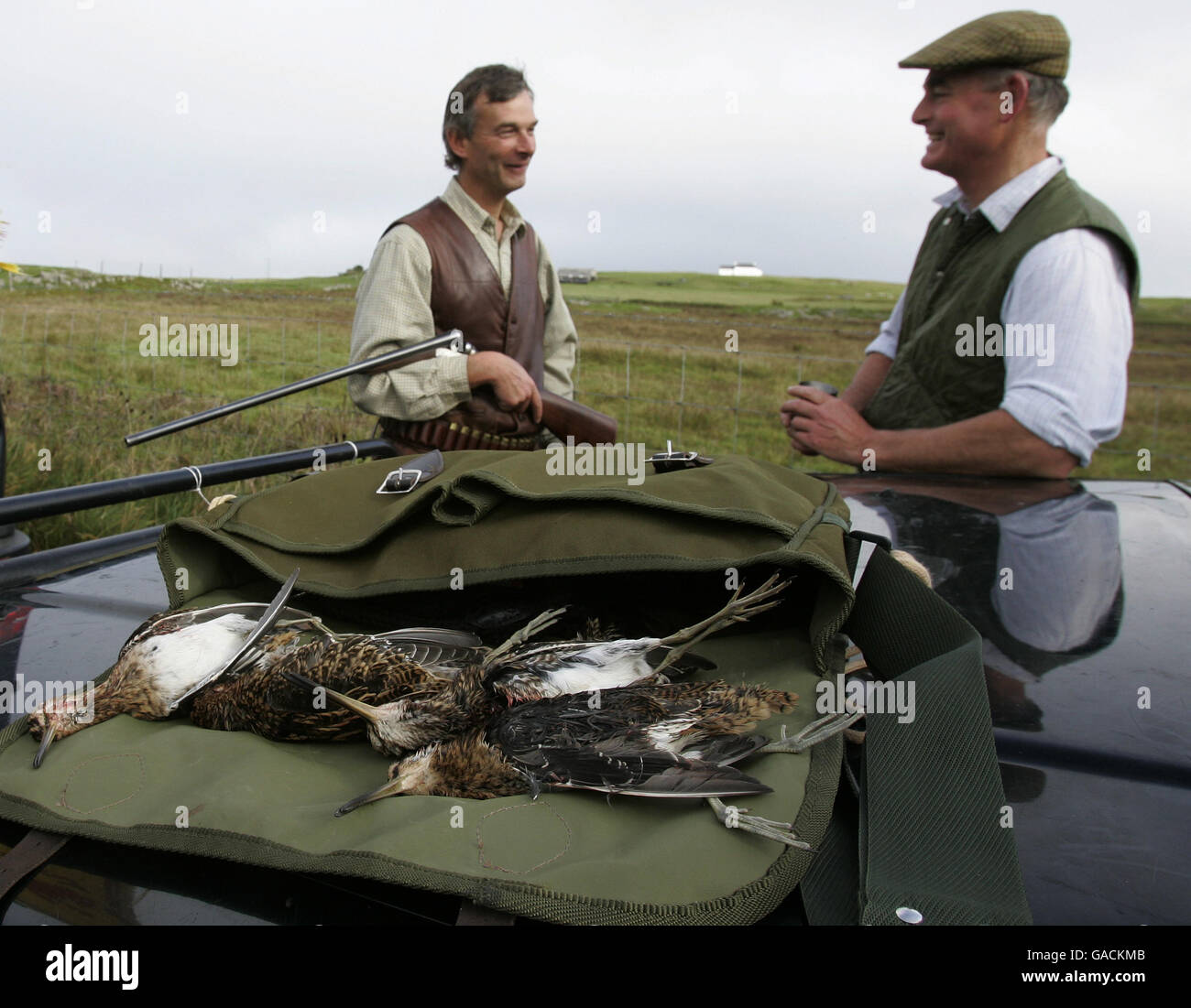 Eine Schießparty Nehmen Sie eine Pause von der Aufnahme Snipe in Die Milton-Gegend der Isle of Tiree Stockfoto