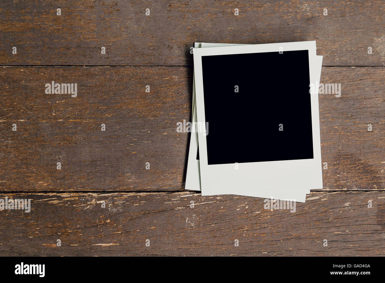 Vintage Bilderrahmen auf alten Holz Hintergrund mit Platz leer Stockfoto