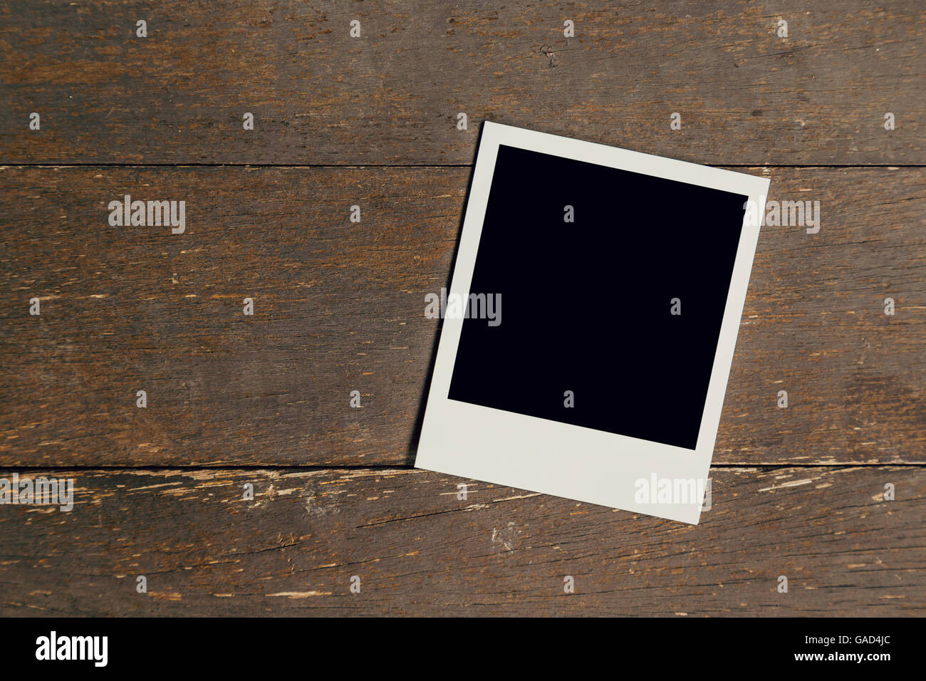 Vintage Bilderrahmen auf alten Holz Hintergrund mit Platz leer Stockfoto