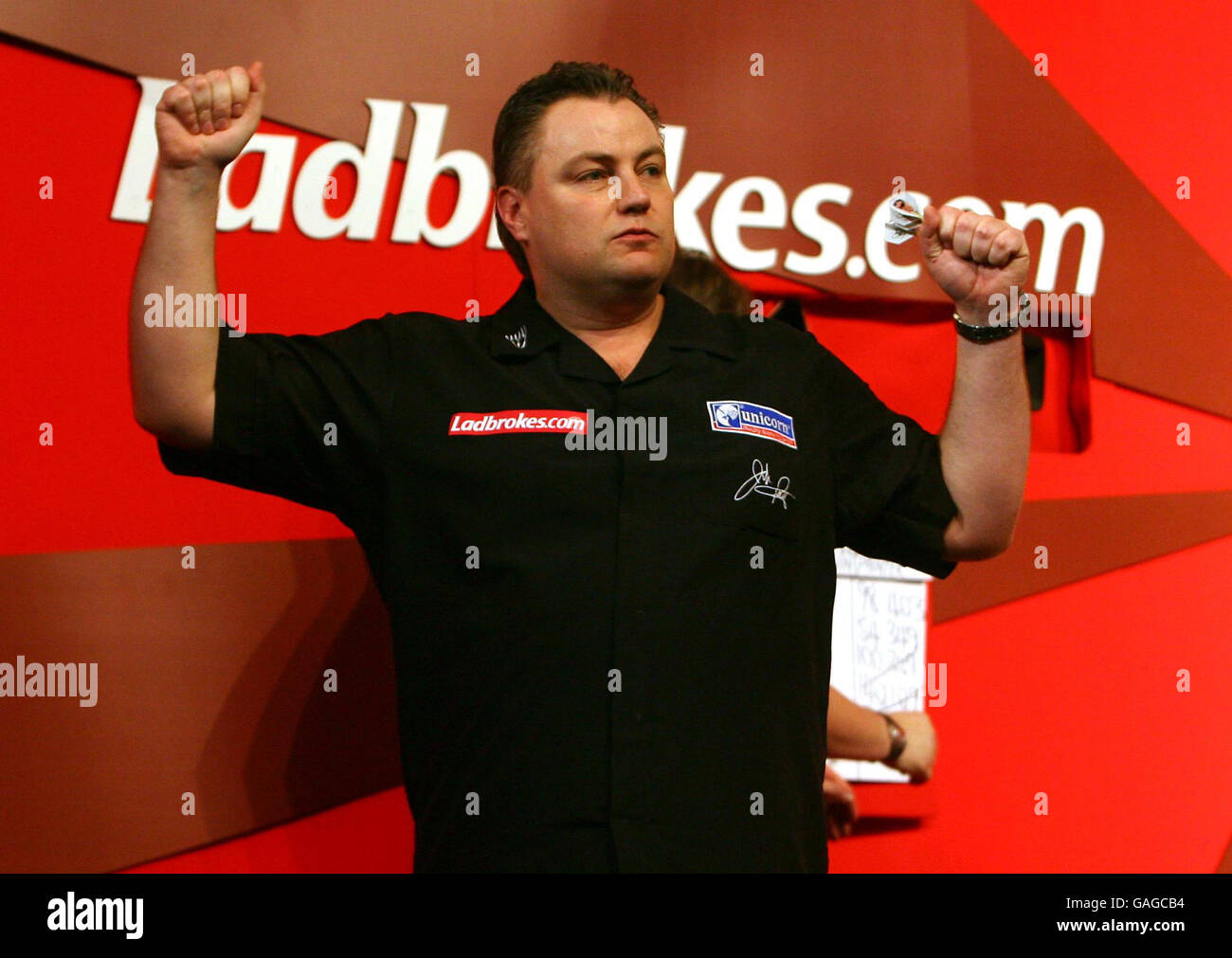 John Part feiert seinen Sieg über Kevin Painter 6-2 während des Halbfinales der World Darts Championship Ladbrokes.com im Alexandra Palace, London. Stockfoto