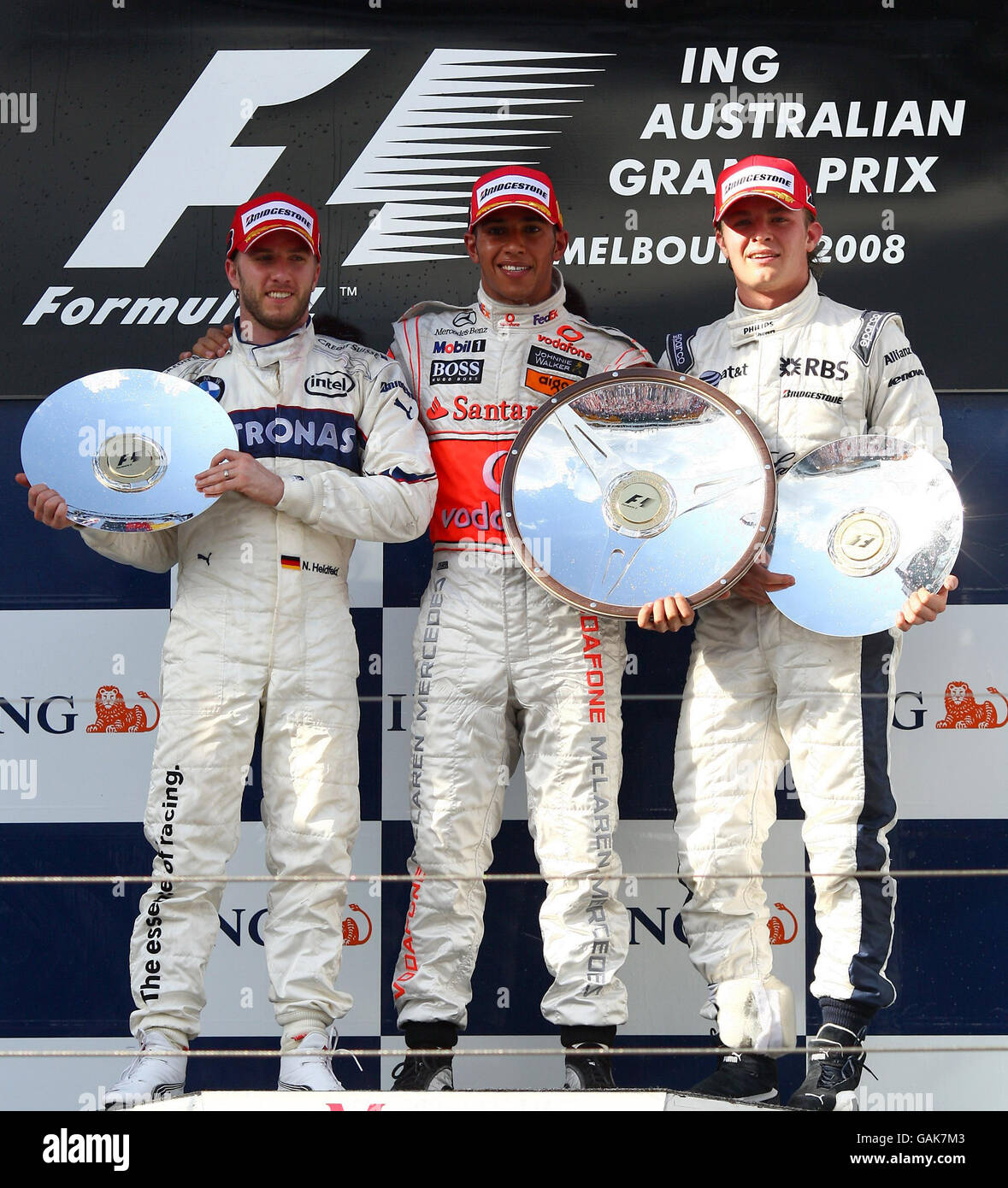McLaren Lewis Hamilton (c) feiert seinen Sieg mit William's Nico Rosberg (r) und BMW sauber's Nick Heidfeld beim Formel 1, Australian, Grand Prix im Albert Park, Melbourne, Australien. Stockfoto