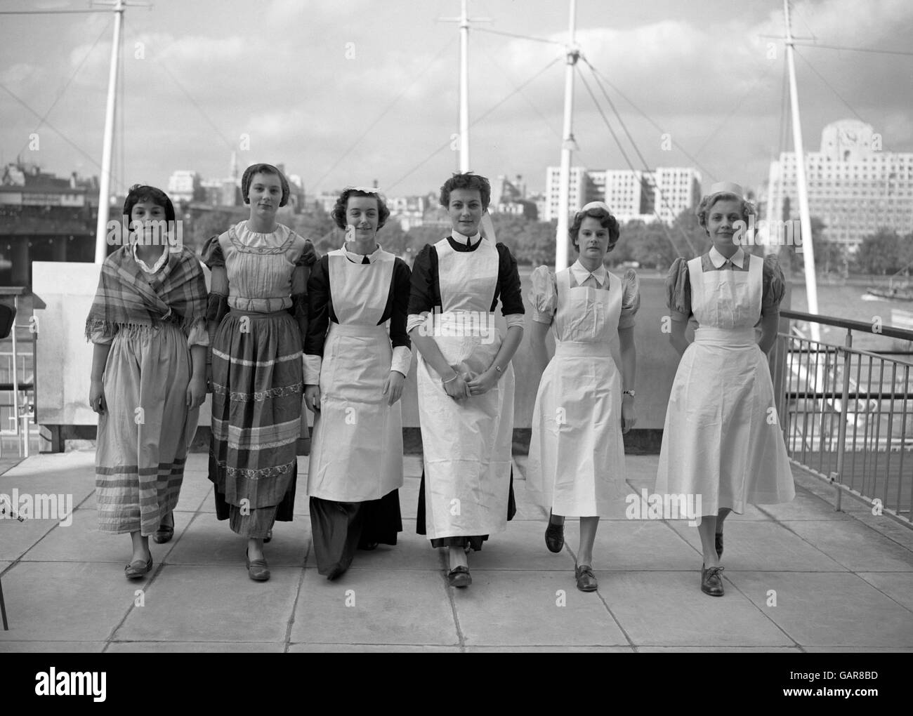Britische Gesundheit - Royal College of Nursing historische Festzug - Krankenschwestern Kostüme - London - 1953 Stockfoto