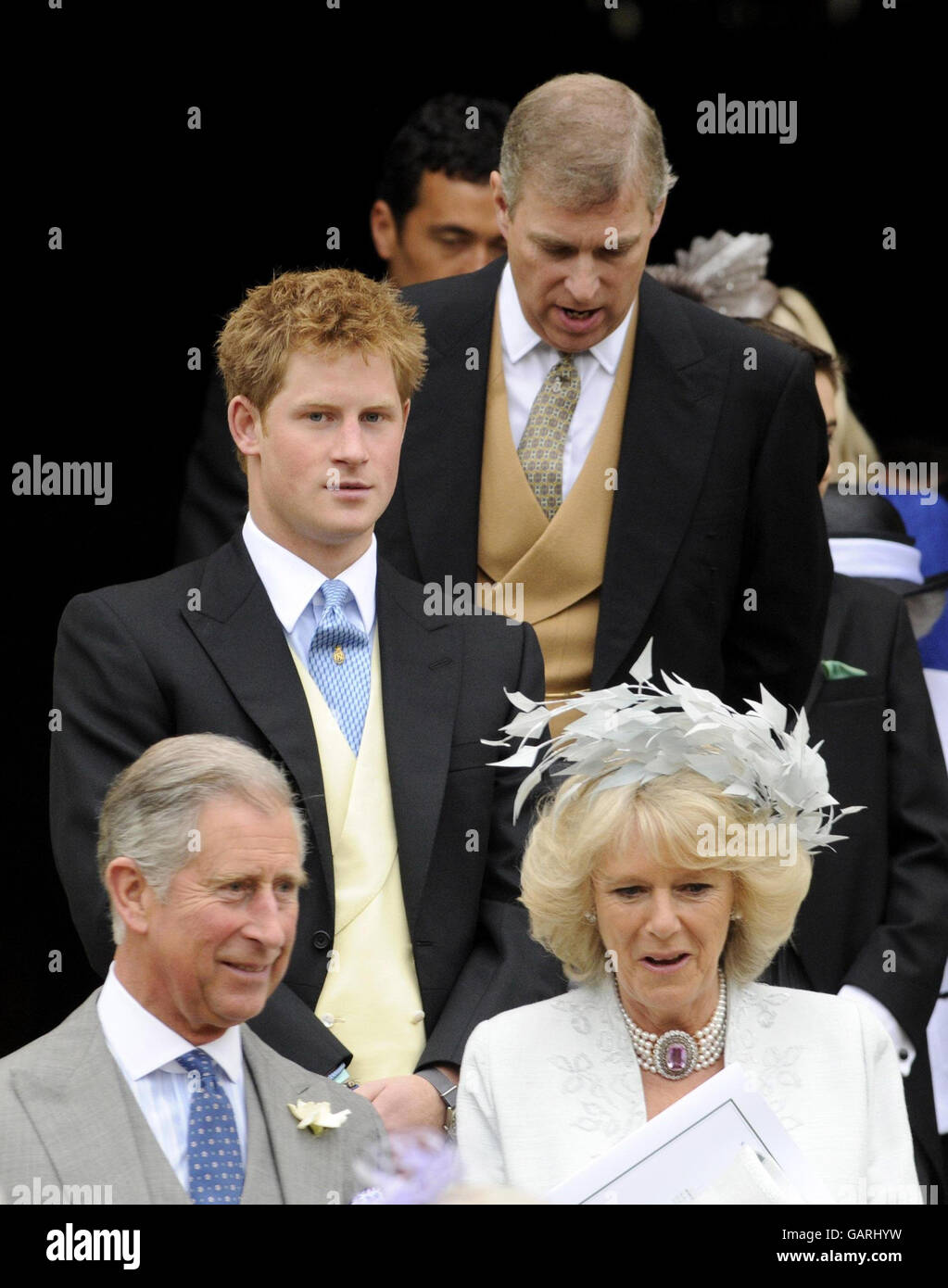 Der Herzog von York, Prinz Harry, der Prinz von Wales und die Herzogin von Cornwall vor der St. George's Chapel in Windsor, England, nach der Hochzeitszeremonie von Peter Phillips und Autumn Kelly. Stockfoto