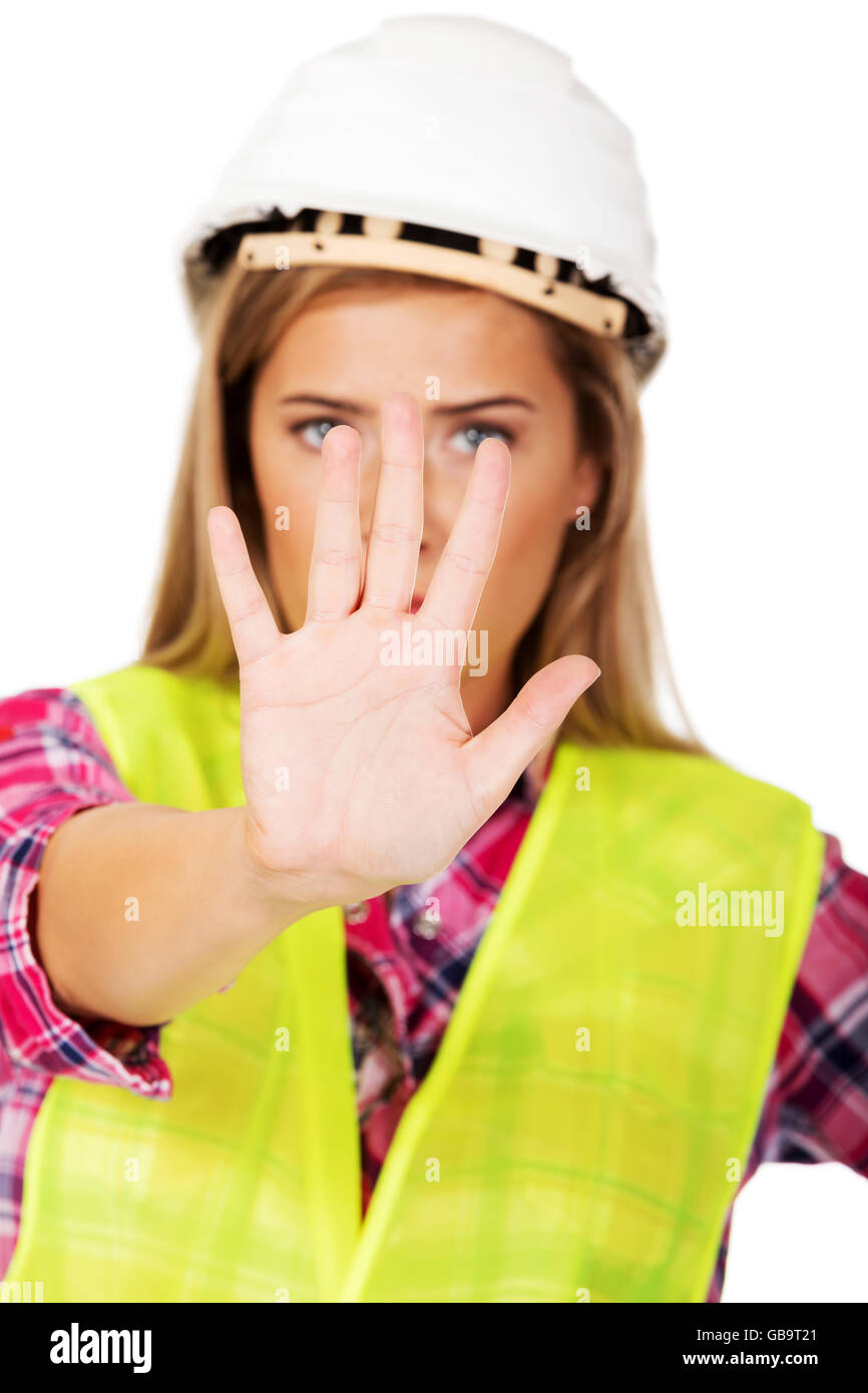 Arbeiter Frau machen Stop-Schild Stockfoto