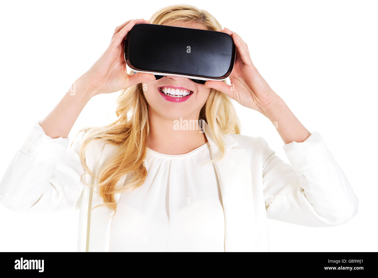 Mädchen tragen virtual-Reality-Brille isoliert auf weiss. Stockfoto