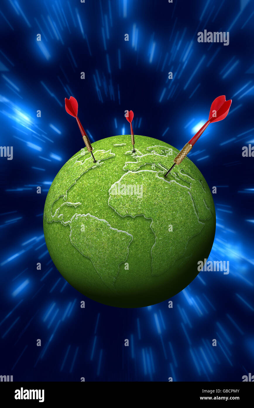 rote Pfeile stecken in eine grüne Erde Stockfoto