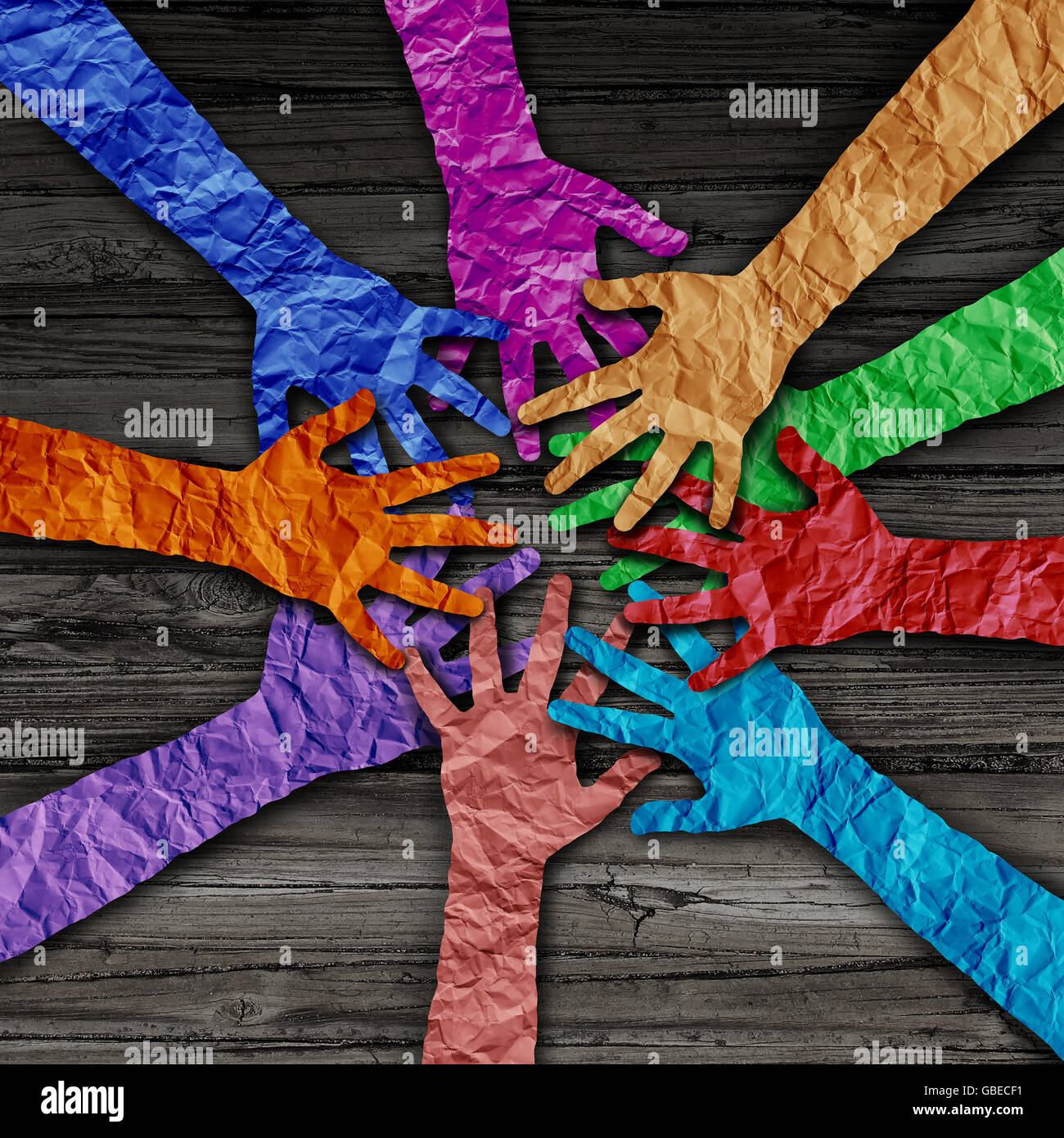 Unterschiedlichste Menschen Team verbinden Hände zusammen als Partnerschaft Teamwork Konzept als eine Gruppe von Papier Schneiden Sie Hände als Vielfalt Zusammenarbeit Symbol in einer 3D Darstellung Stil. Stockfoto