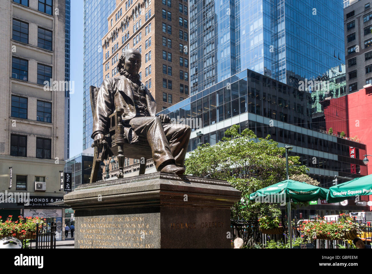 Statue von Horace Greeley, Greeley Square, NYC, USA Stockfoto