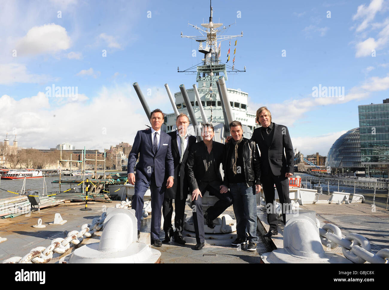 Die 80er Jahre Popgruppe Spandau Ballet kündigt ihr Comeback bei einer Fotoschau auf der HMS Belfast in London an. Stockfoto