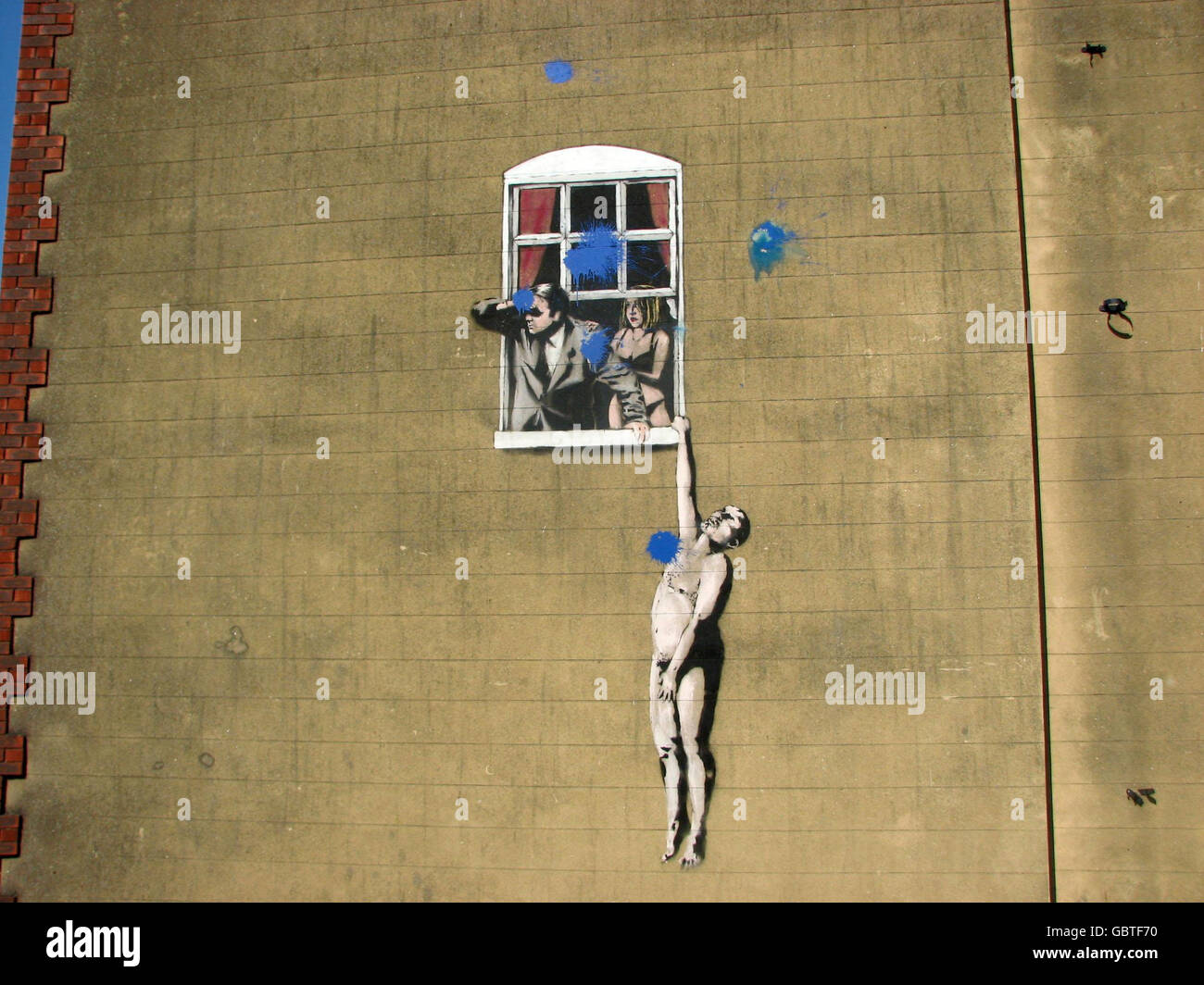 Banksy Wandbild verwüstet Stockfoto