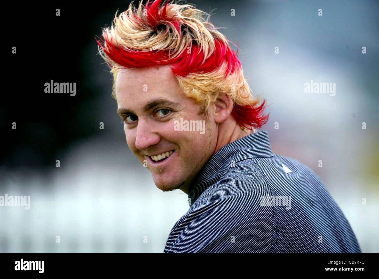 Der Engländer Ian Poulter zeigt seinen auffälligen Haarschnitt während eines Übungsrunde Stockfoto