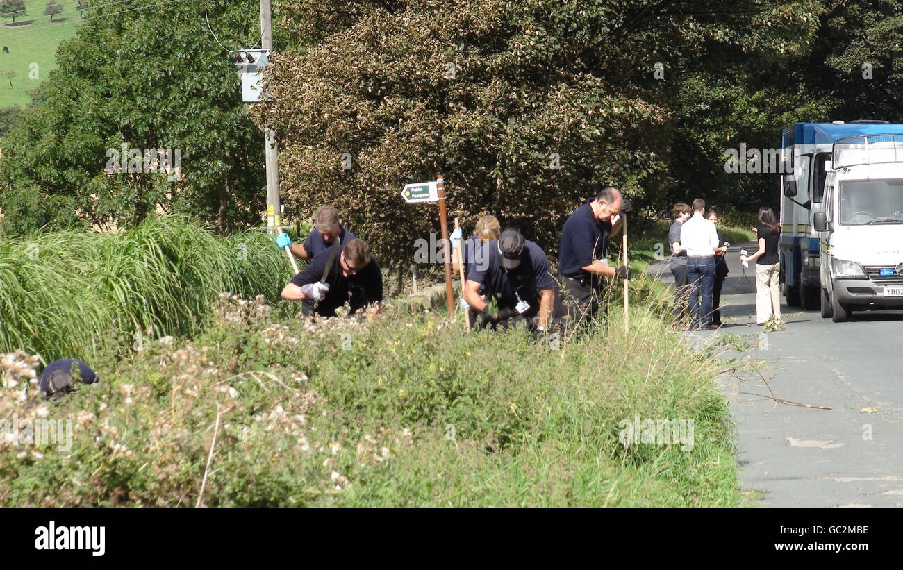 Körper in Parkstreifen gefunden Stockfoto