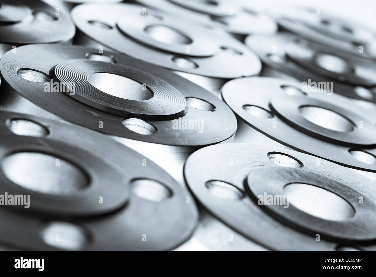 Wallpaper von Flachstahl-Flansch isoliert auf weiss. Stockfoto