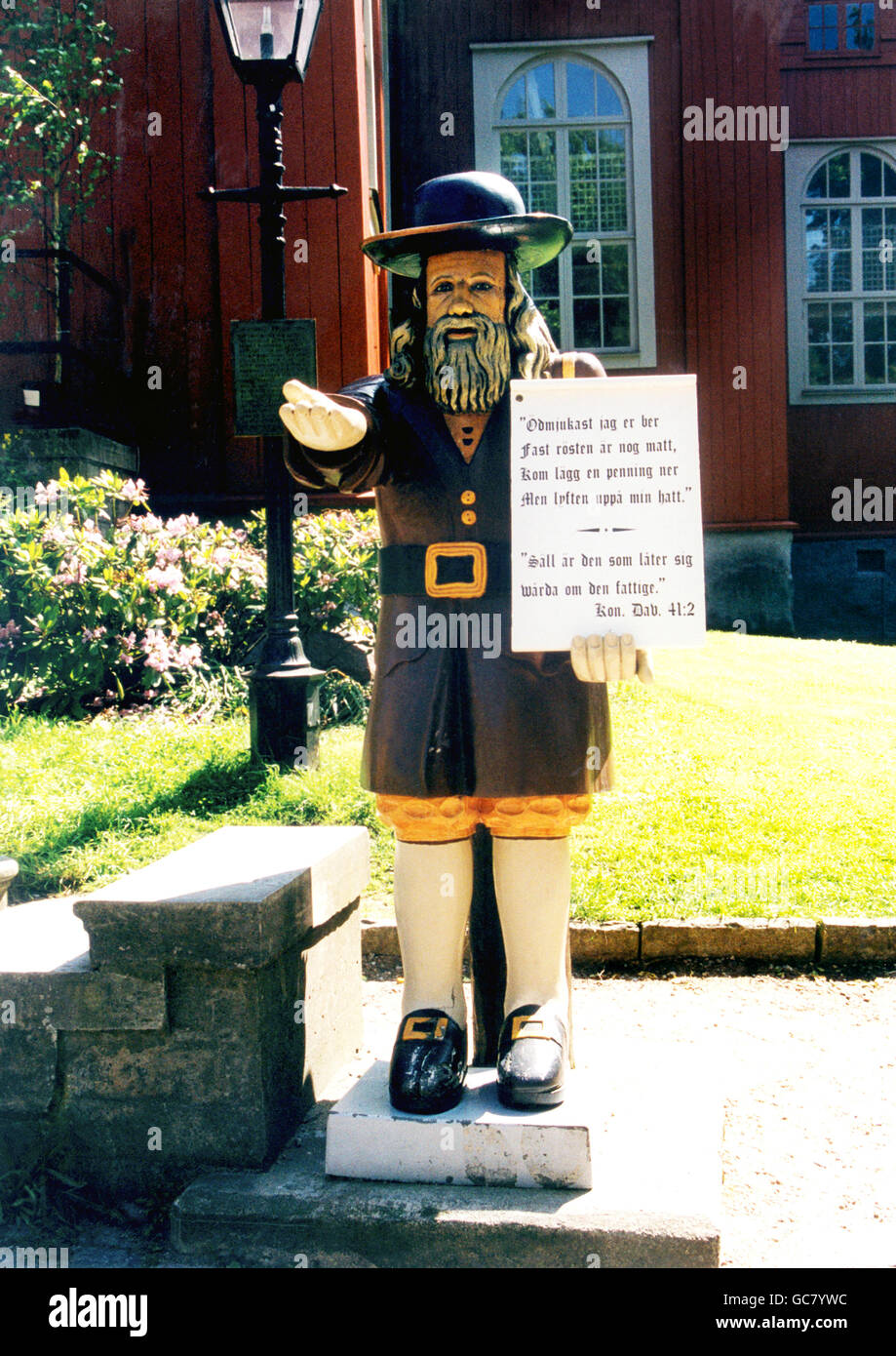 ROSENBOM Holz Skulptur außerhalb Admiralität Kirche eine Spardose für Armenfürsorge Stockfoto
