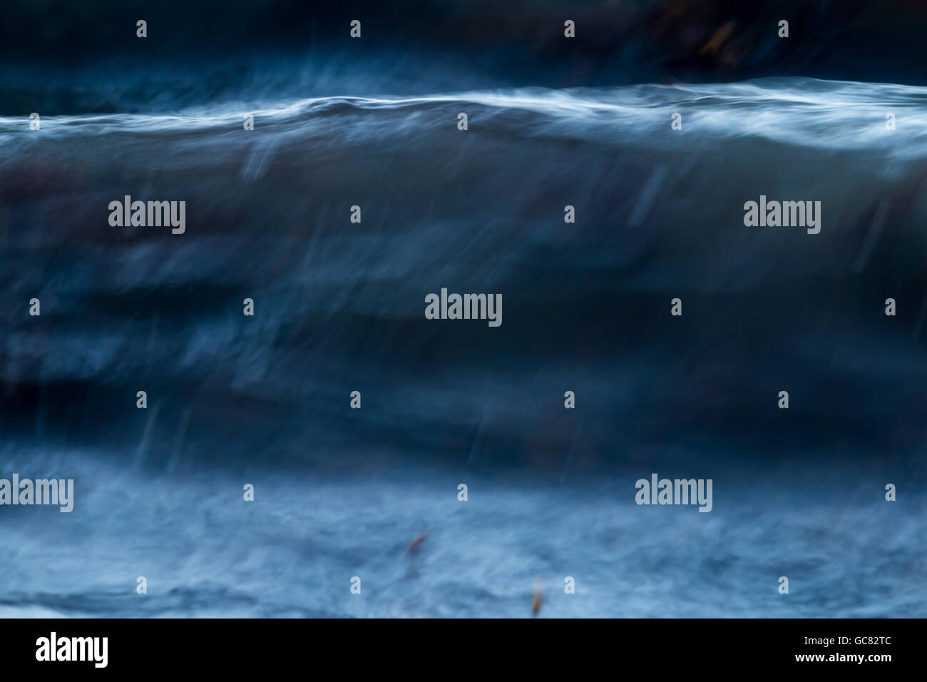 Abstrakte Wave, Str. Marys, Isles of Scilly, Januar 2016 Stockfoto