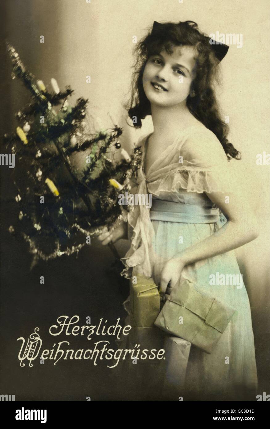 Weihnachten, Frau mit Weihnachtsbaum und Geschenke, &quot;Herzliche
