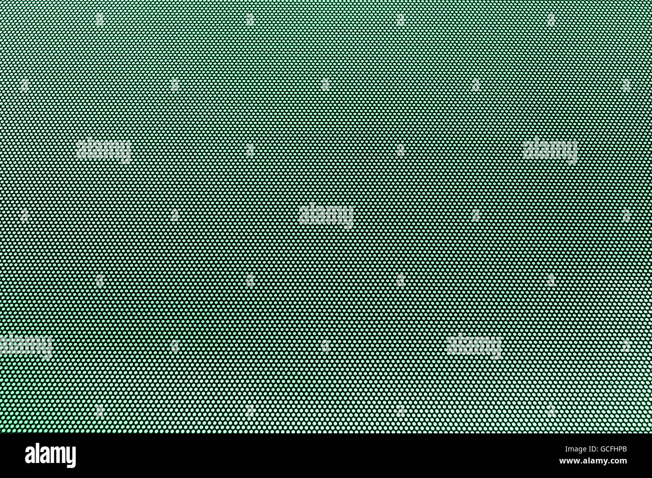 Dot-Maske vor Minze grün grau leicht grünlich bedecktem Himmel psychedelische Wirkung Stockfoto