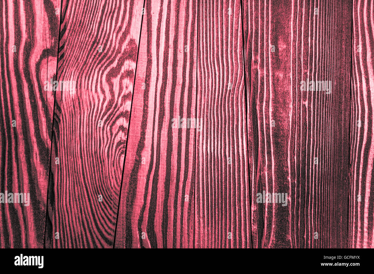 Perfekte unregelmäßige alt und grobe Holz Holz Oberflächenstruktur Hintergrund rot rötlich grau Stockfoto