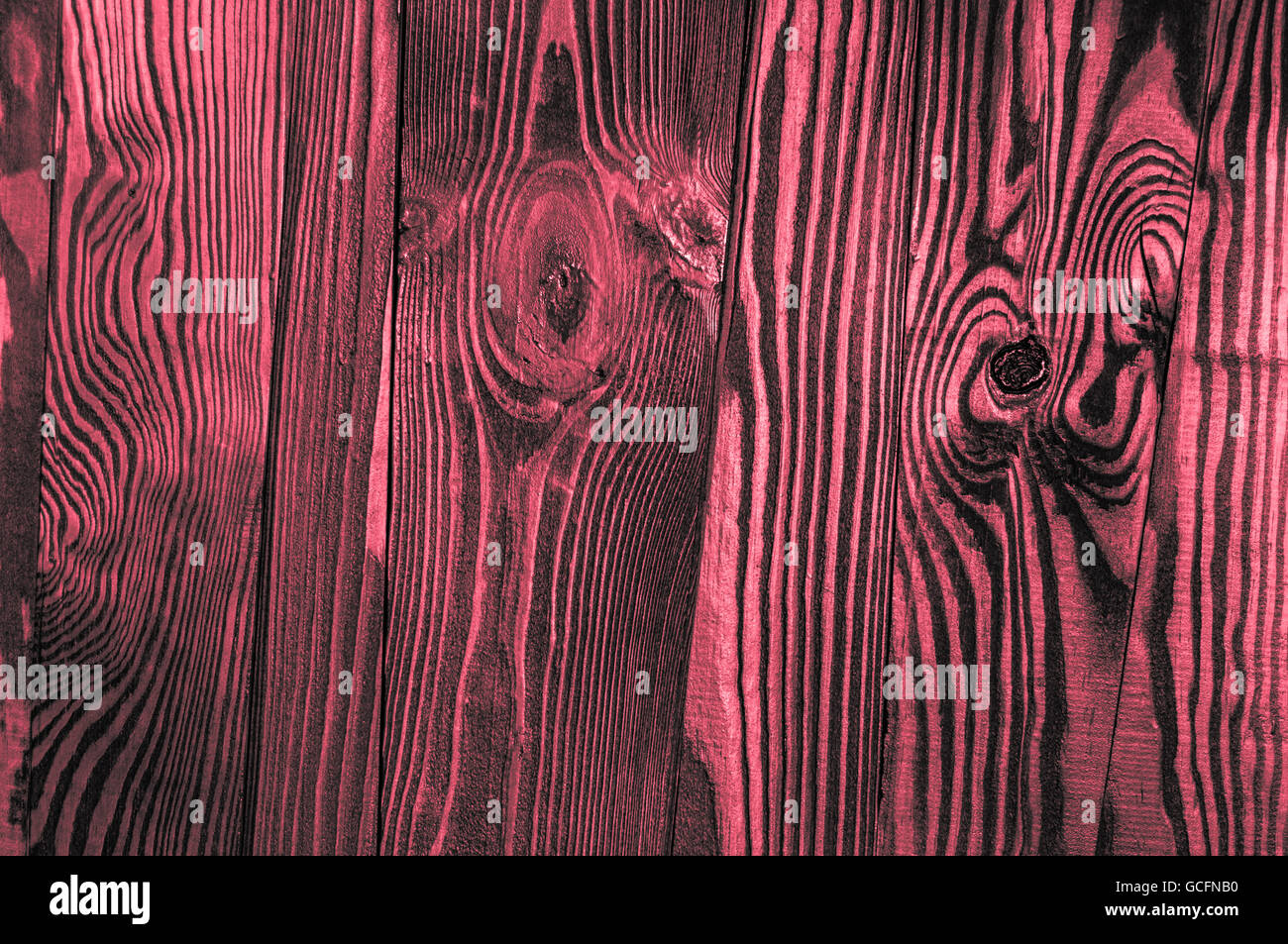 Perfekte unregelmäßige alten dunklen hellen Holz Holz Oberflächenstruktur Hintergrund rot rötlich grau Stockfoto