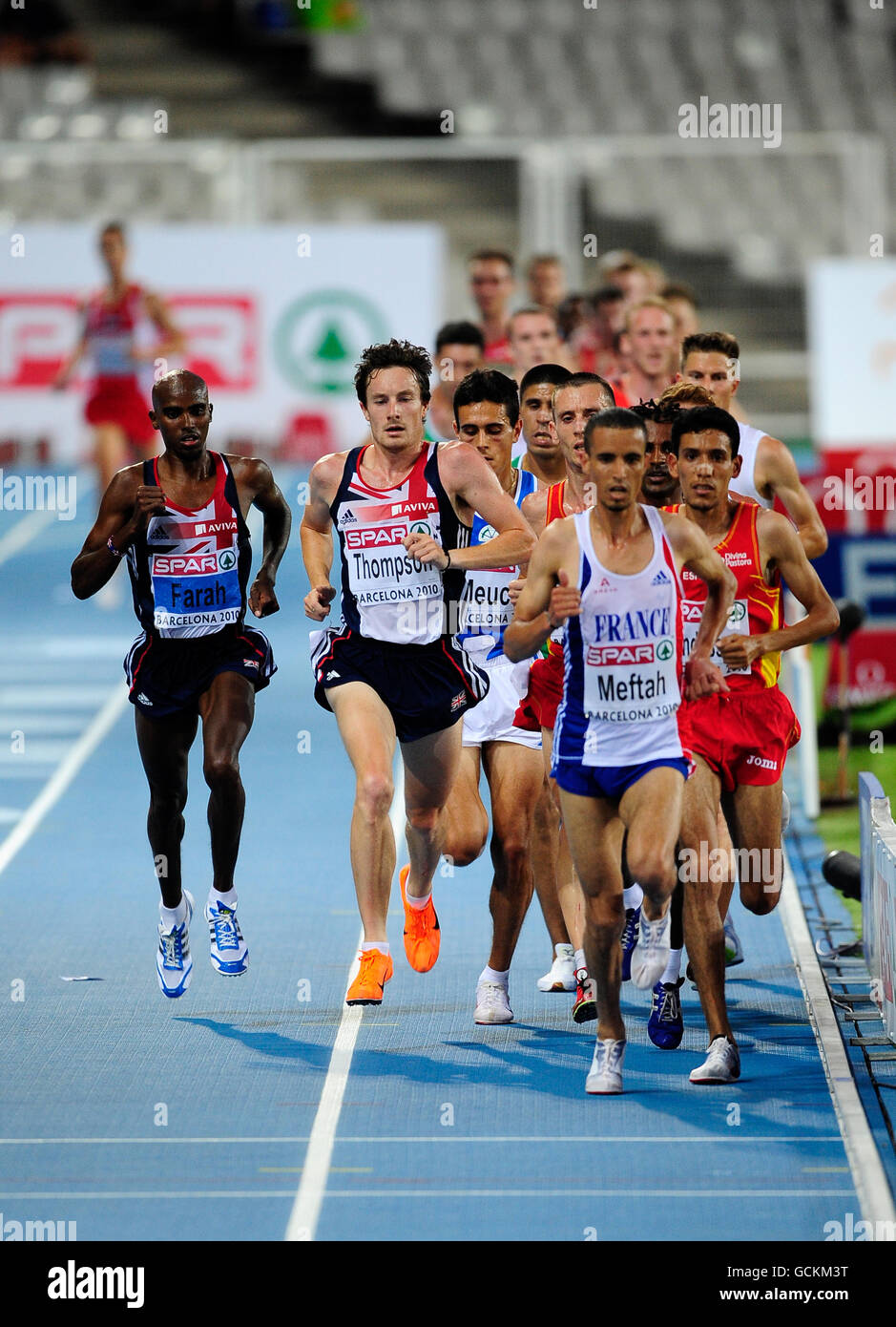 Großbritannien Chris Thompson und Mo Farah (ganz links) Auf dem Weg zum ersten und zweiten in der 10,000 Meter-Finale Stockfoto