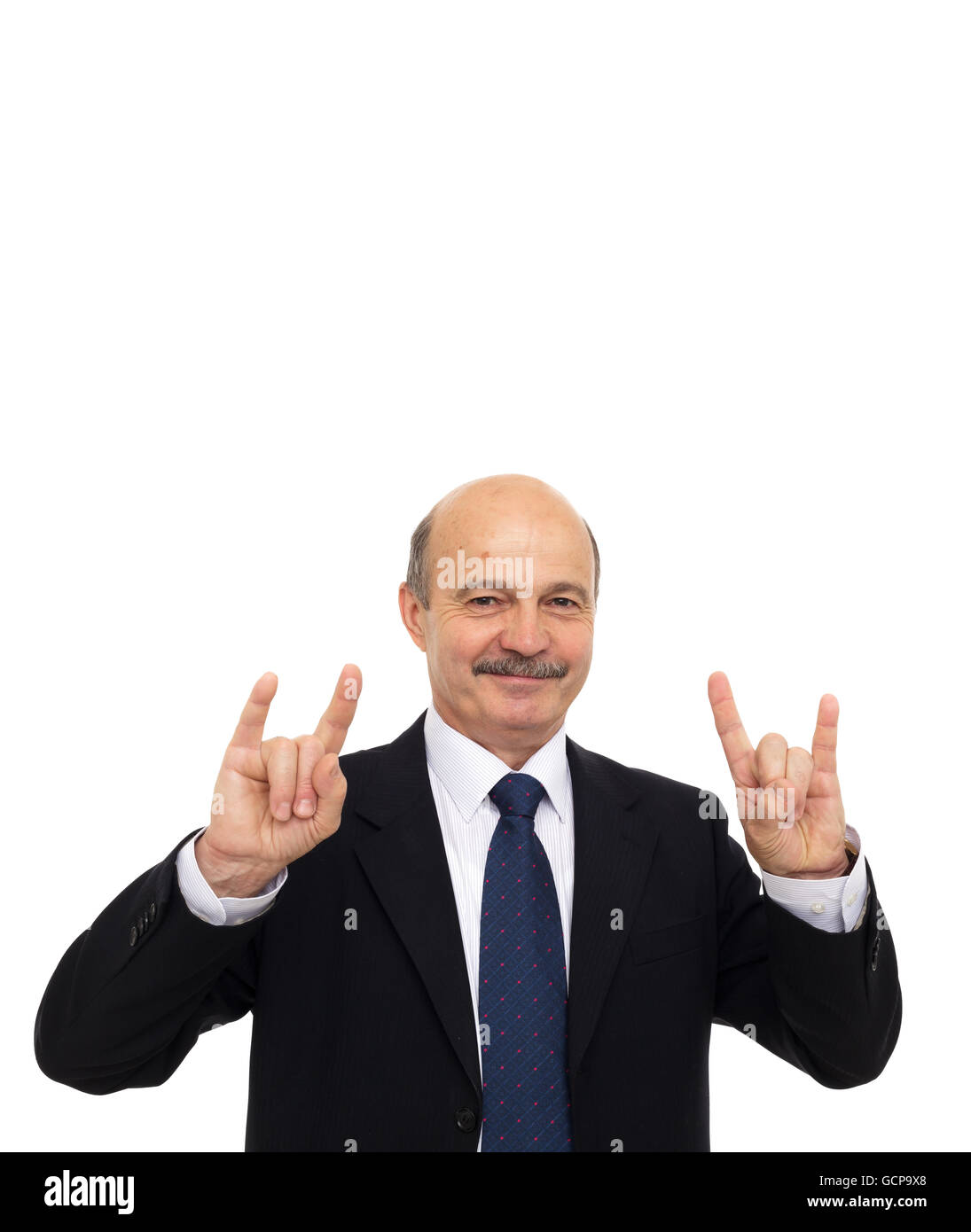 Amateur Rock-Musik bei einem Geschäftstreffen. beleben Sie alte. Älterer Mann in einem Anzug zeigt ein Zeichen der Hörner Stockfoto