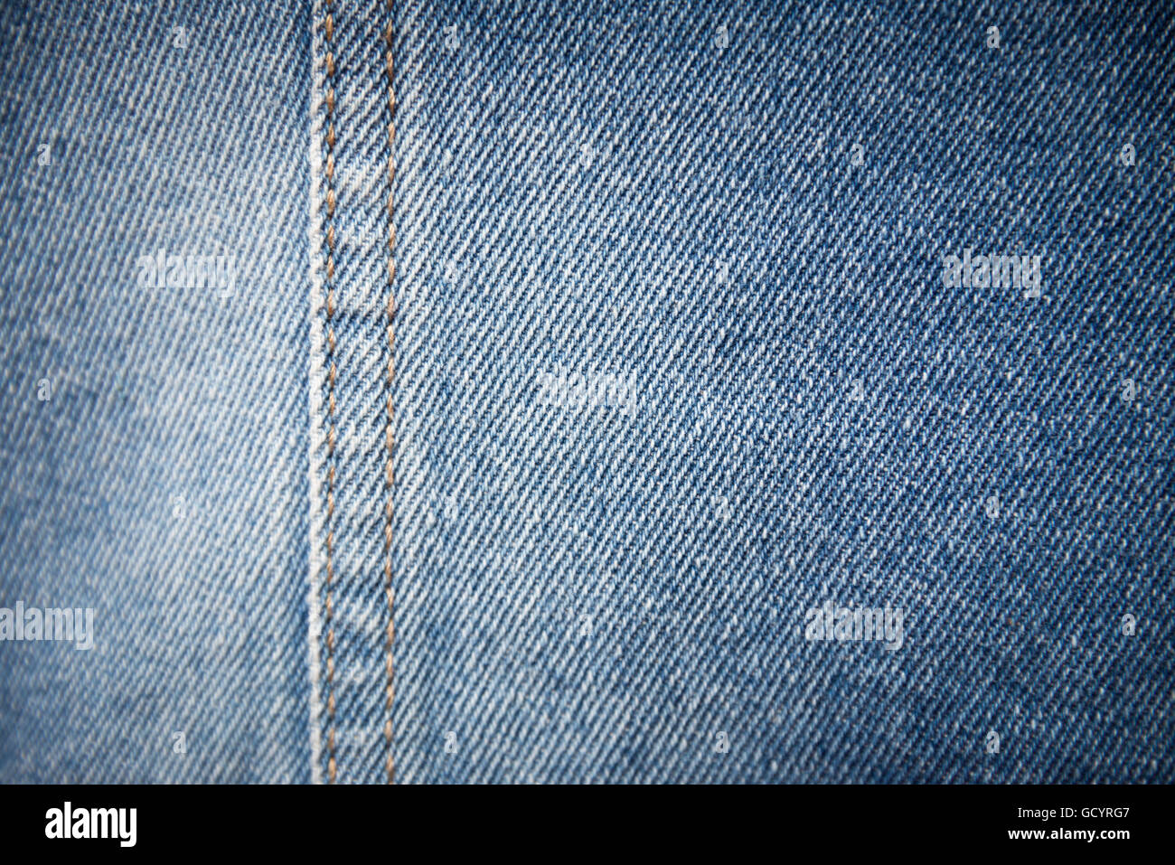 Blue-Denim-Textur-Hintergrund mit Naht Stockfoto