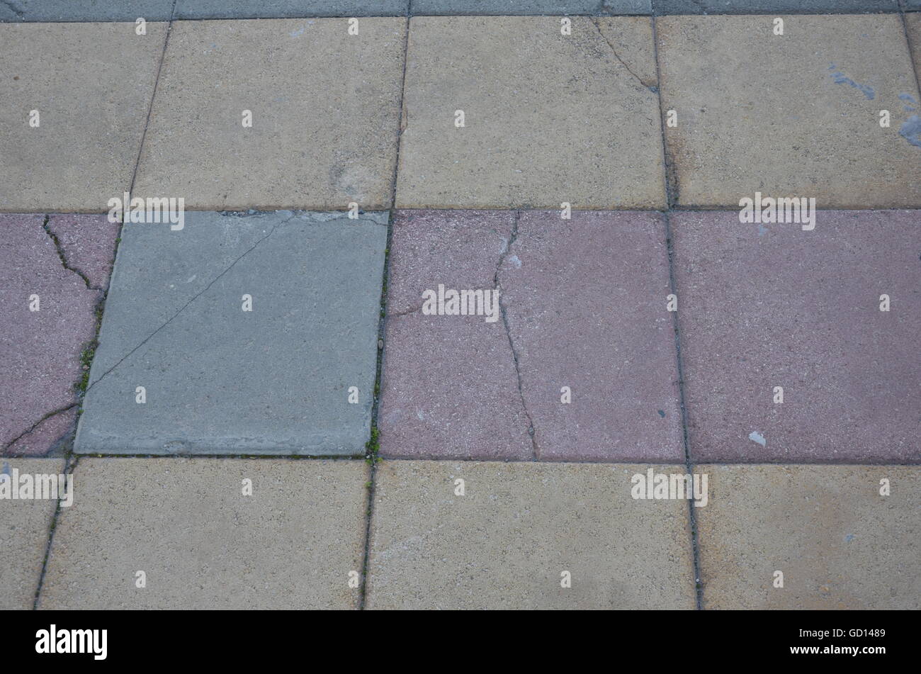 Gebrochenen Boden Fliesen grau gelb rote Straße Hintergrund Kopie Raum Pastell Stockfoto