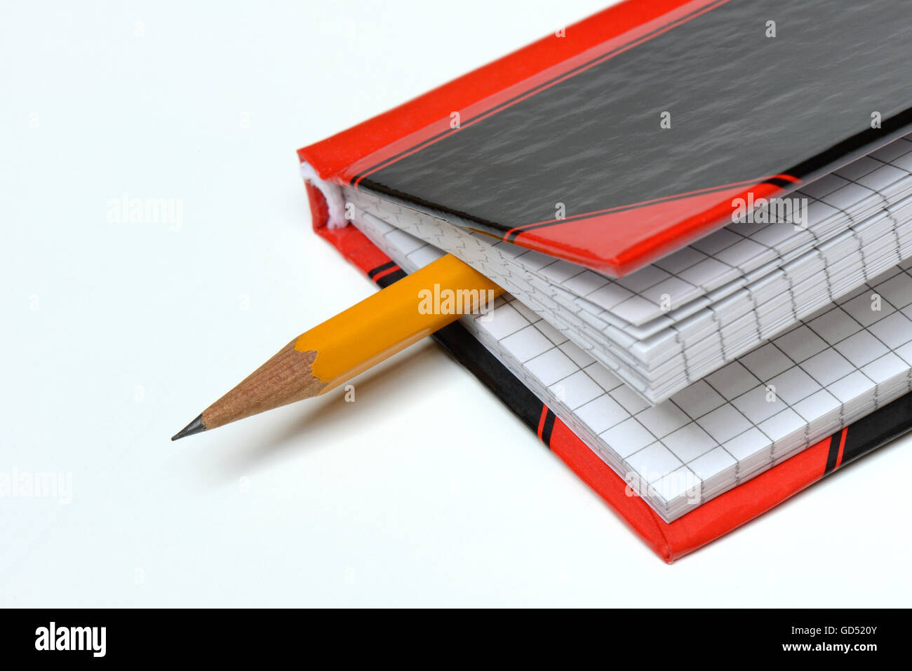 Bleistift Und Notizbuch Stockfoto