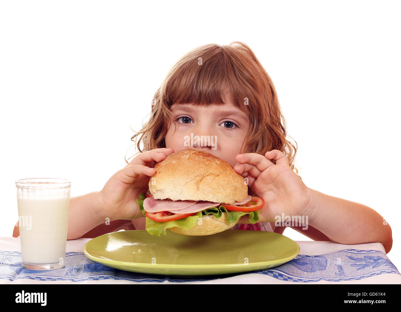 hungriges kleine Mädchen große Sandwich Essen Stockfoto