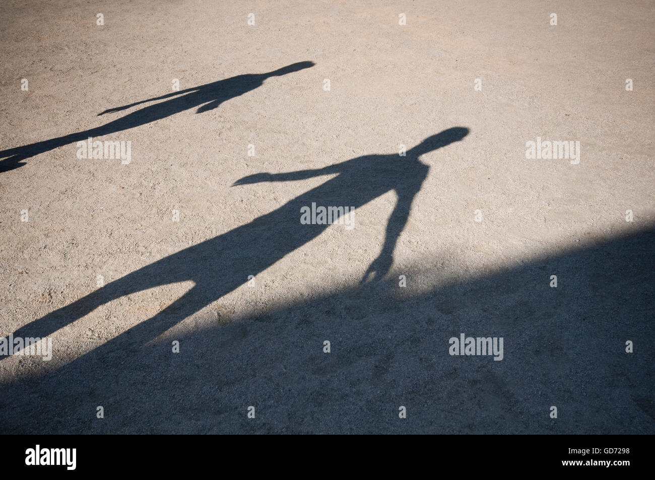 Menschen zu Fuß mit Schatten Stockfoto