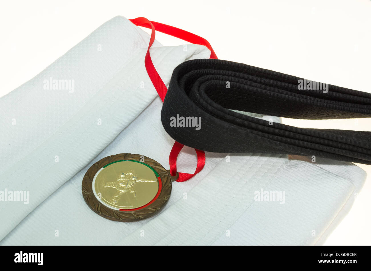 Black Belt in Martial Arts und ein Teil des Judo uniform und Medaille Stockfoto
