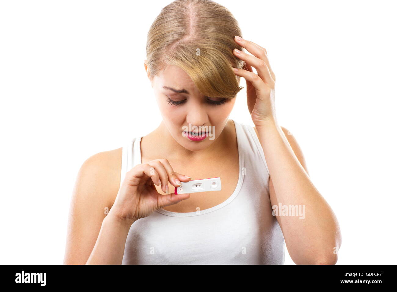 Traurige unglückliche besorgt zeigt Schwangerschaftstest mit positiven Ergebnis, Schwangerschaftstest, ungewollte Schwangerschaft überprüfen Stockfoto