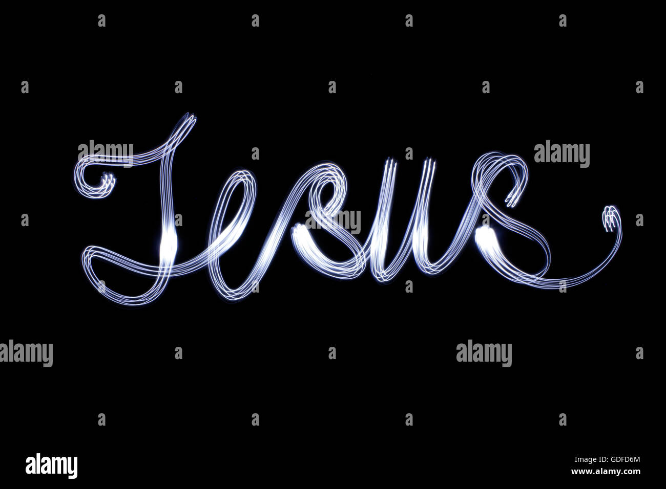 Foto von einer Zeichnung des Wortes Jesus mit Langzeitbelichtung Effekt Licht Stockfoto