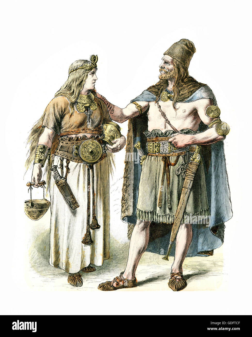Mann und Frau in den Kostümen der Bronzezeit deutschen Stockfoto