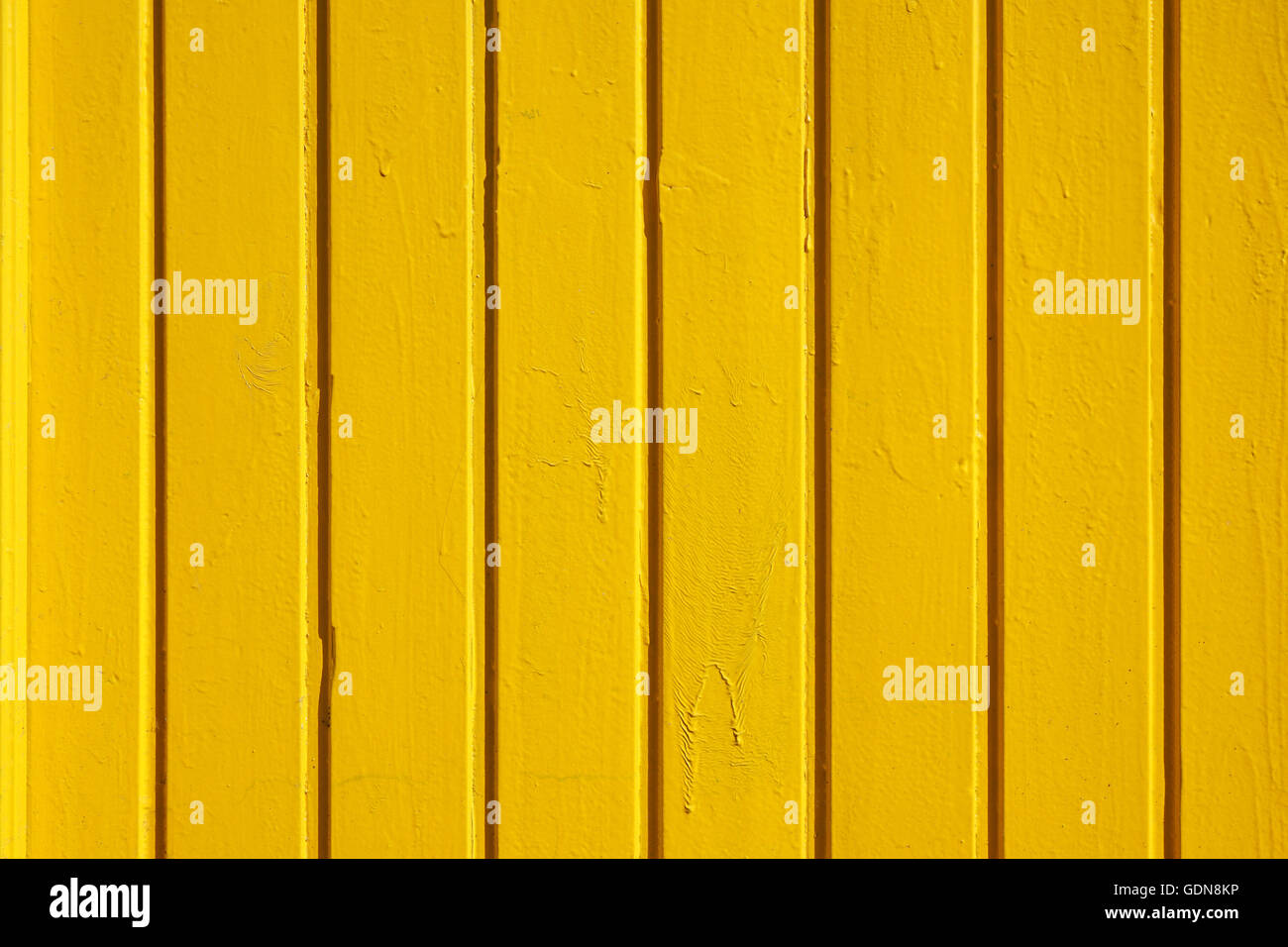 gelbe Holzwand Hintergrund Stockfoto