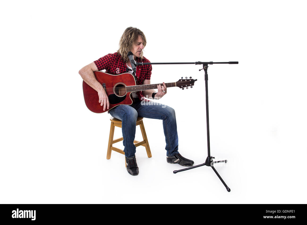 Musiker spielen Gitarre auf studio Stockfoto