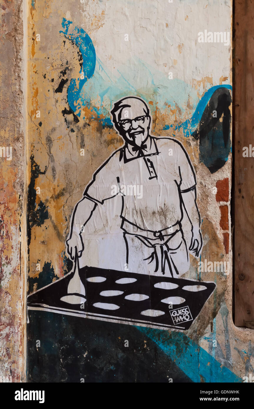 Graffiti-Kunst an der Wand in Fort Kochi. Diese satirische street-Art durch die GuessWho, ausgeführt einer Stockfoto