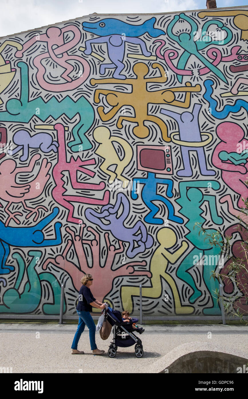 Keith Haring Wandbild an der Wand in Pisa, Toskana, Italien Stockfoto