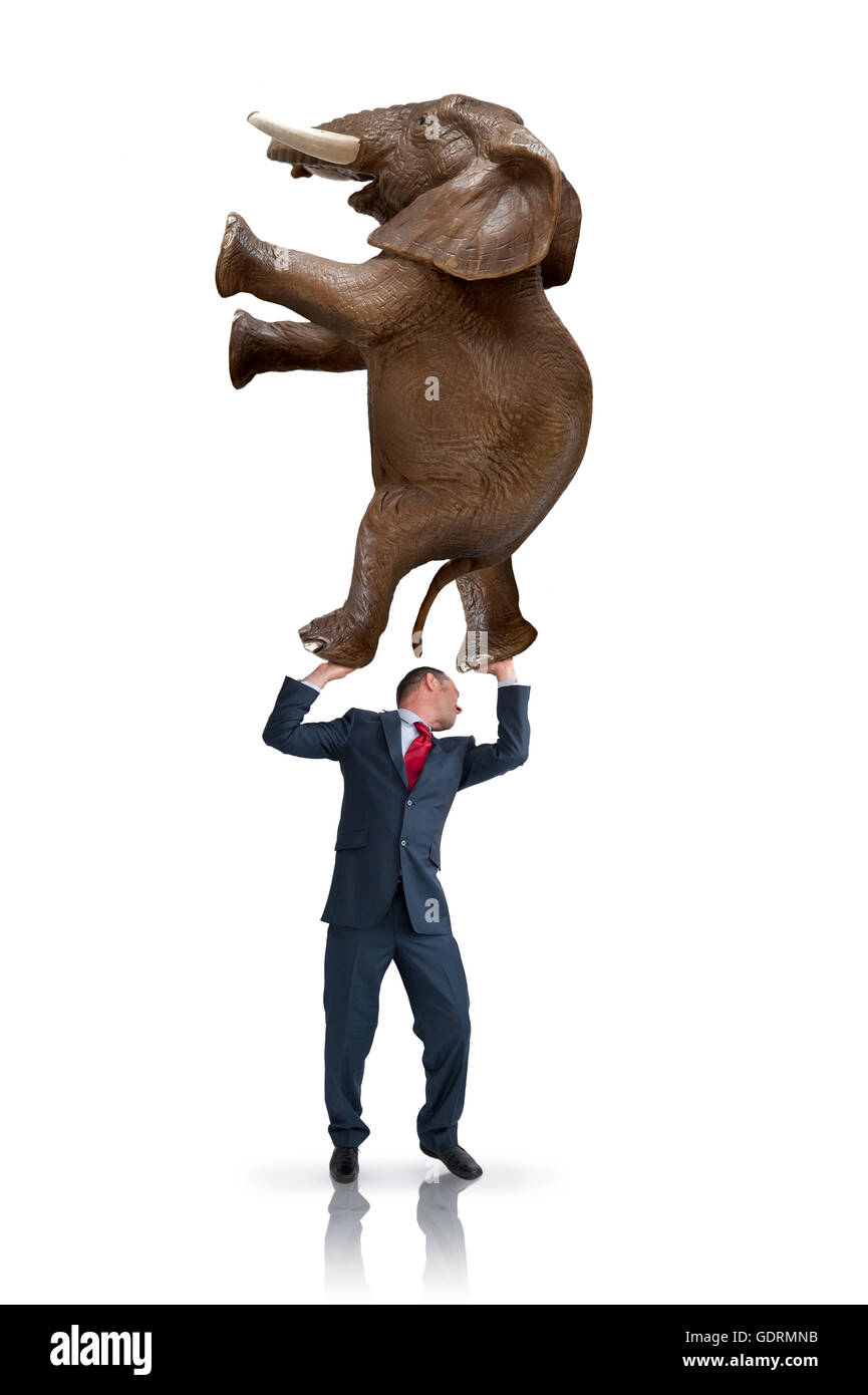 Business Balance Herausforderung Konzept Geschäftsmann Gewicht Elefanten über seinen Kopf halten Stockfoto
